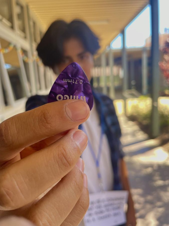 “I like to play guitar,” said Kaiser Orduna (10), holding his guitar pick in the hallway. He uses it
to play his favorite genre, classic rock.
Photo and caption by Joaquin Santamaria.