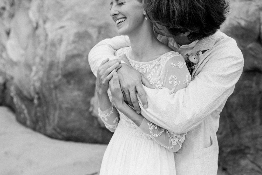 Mercy and Ben Rudolph at the beach on their wedding day.