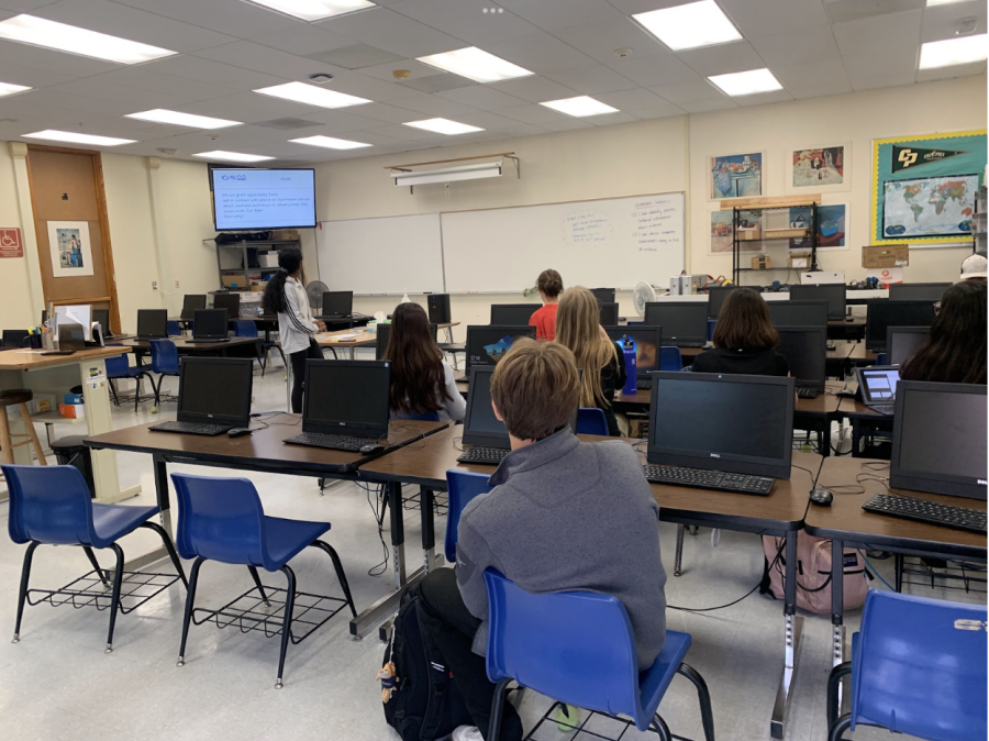 The Stem Club in session with Sagarika Manian giving a grant presentation in T-10.