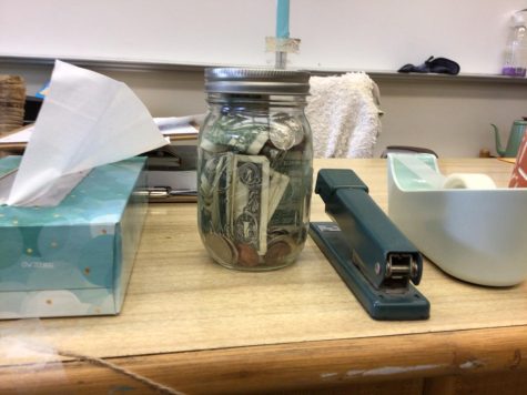 A photo of the donation jar in Mercy Rudolph’s classroom.