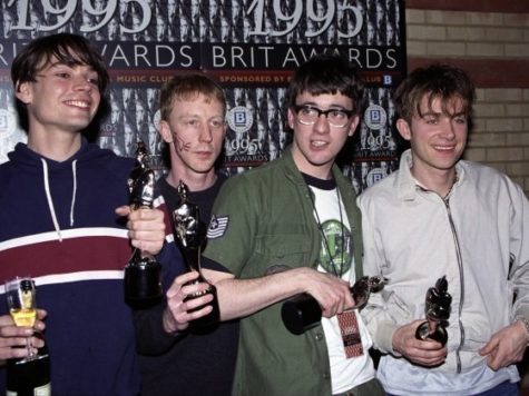 Blur with their four Brit awards. Alex James, Dave Rowntree, Graham Coxon, Damon Albarn (from left to right).
