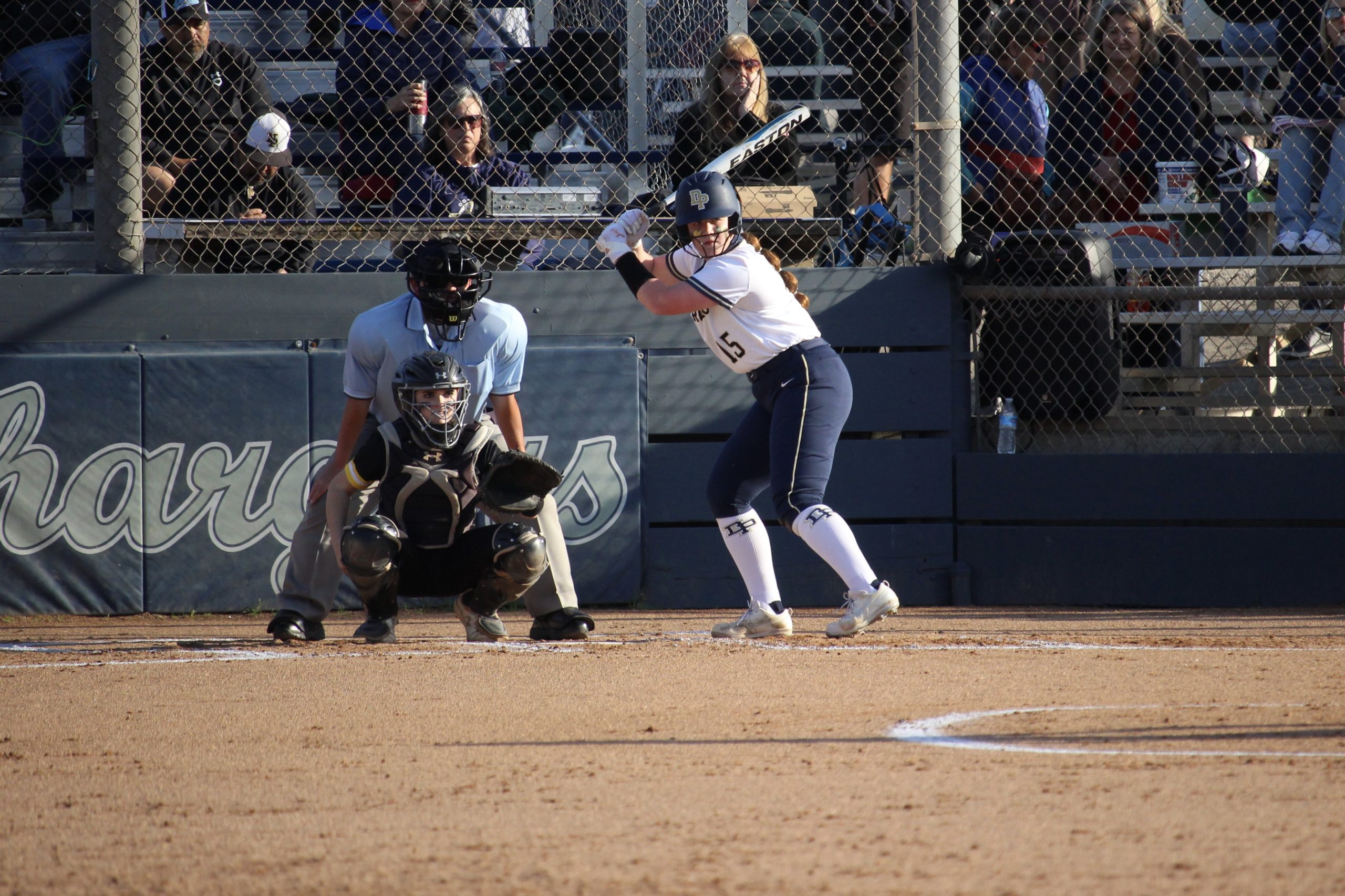 Varsity Kaitlyn Ashby(11) is up to bat