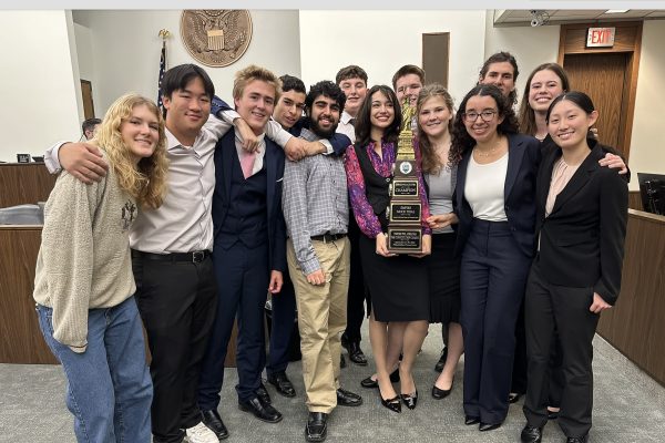 Dos Pueblos High School mock trial team posing with Empire Mock Trial Philadelphia Classic trophy.