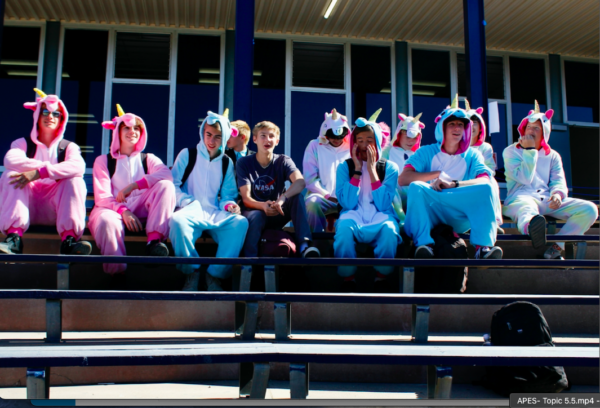 A group of students dressed up as unicorns for Halloween. 