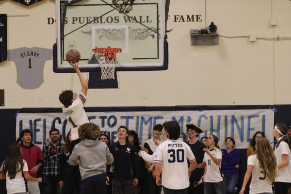 Seth Tedeschi (12) scoring a point for the seniors in their game against the sophomores.