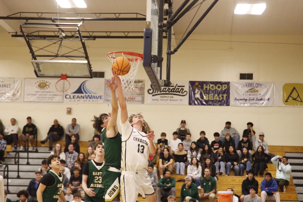 Coulter Jay (11) makes a layup.