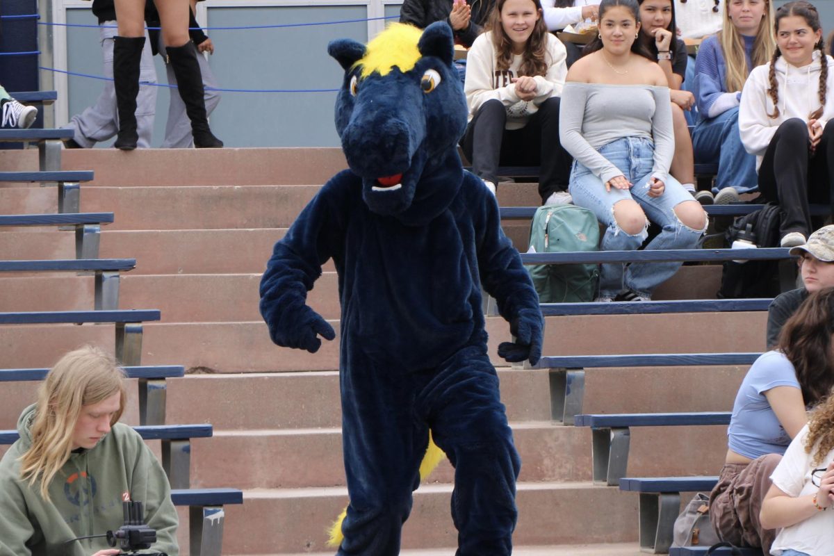 Charlie the Charger enters the Greek for the 2024 Airbands performance 