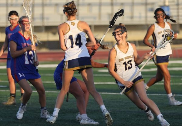 The DPHS Girls Lacrosse team in a game against San Marcos High School. Photo courtesy of DPHS Athletics.

