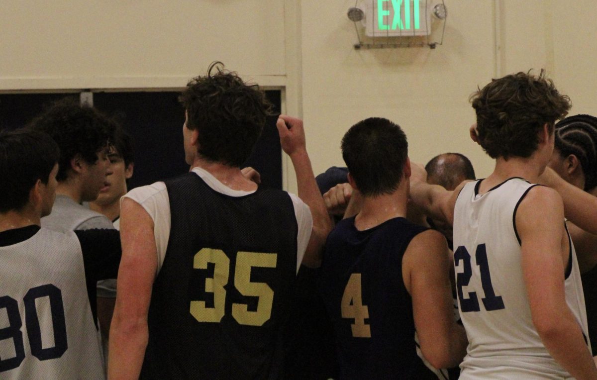 Dos Pueblos varsity boys basketball huddles after a practice.