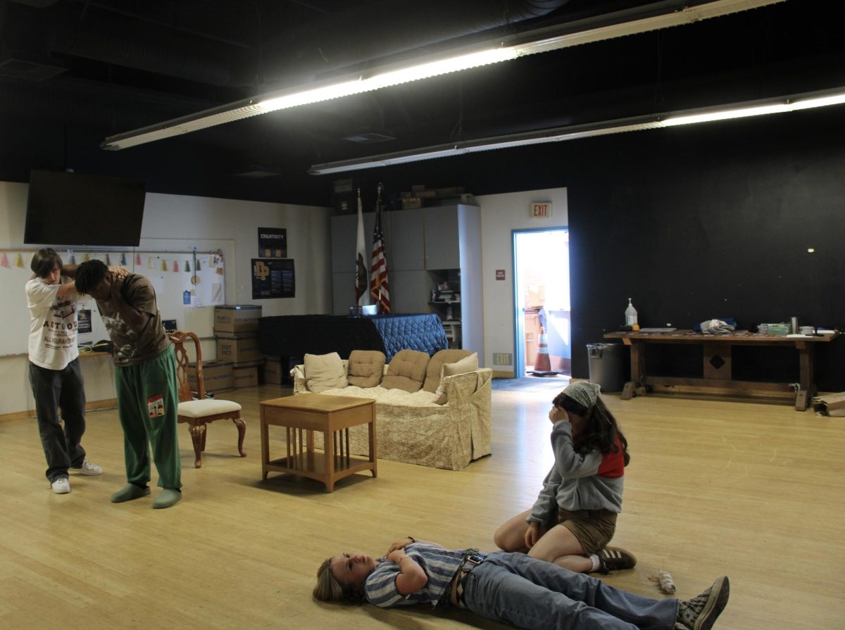 DPTC students Anisia Kourakis, Abby Simonsen, Lucas Trexler, and Kaarlo Anderson rehearsing for their scene “Dracula”