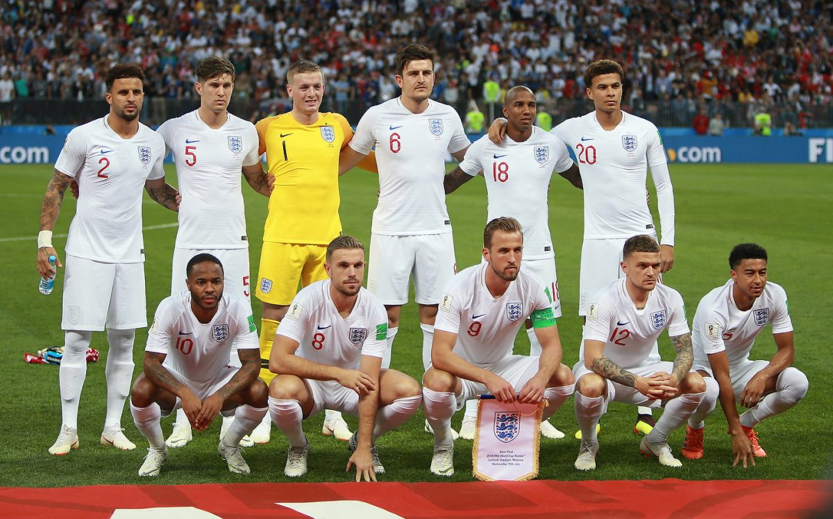 The England national football team lines up before a 2-1 loss to Croatia in the FIFA World Cup 2018 semifinal.