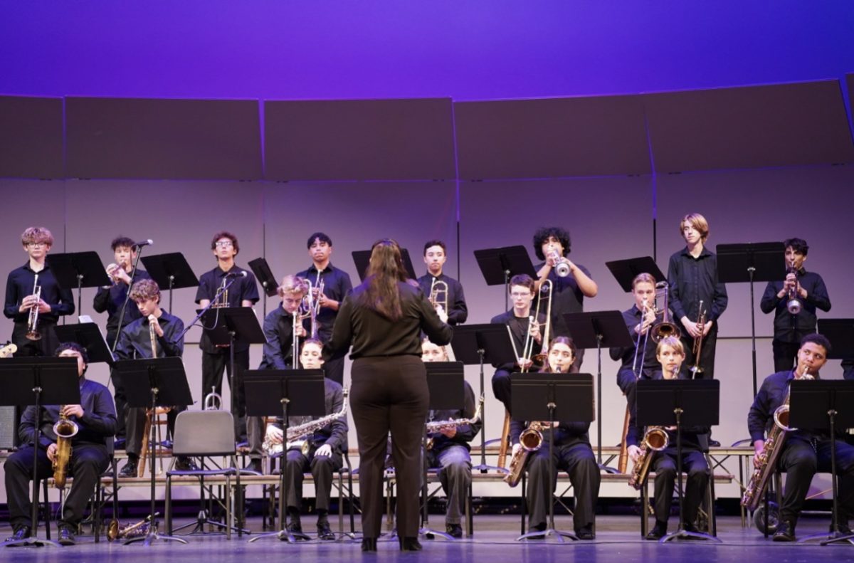 Band students perform onstage.